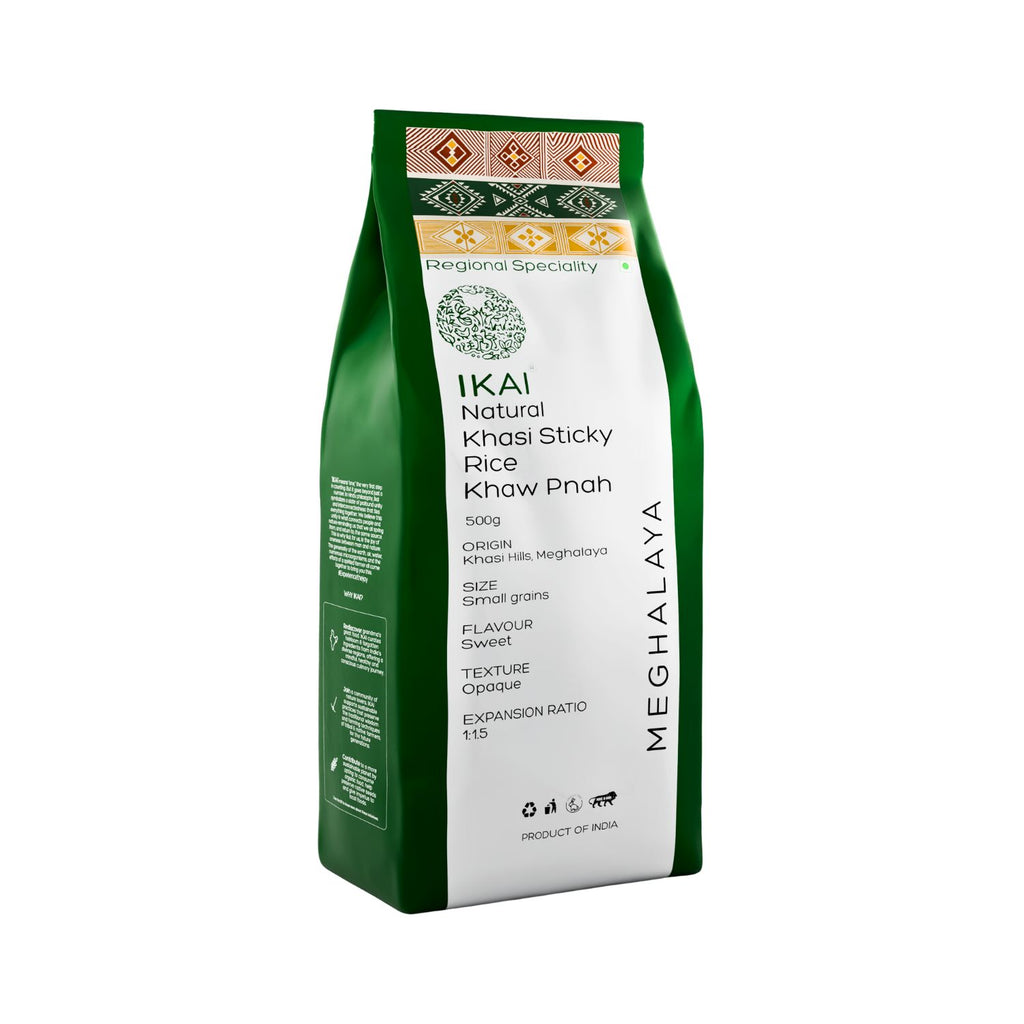 Green and white packaging of IKAI Natural Khasi Sticky Rice on a white background