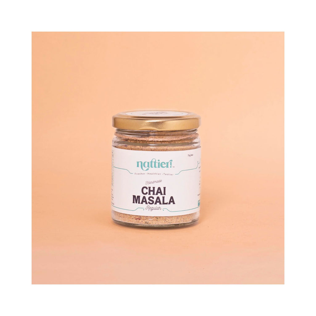 Jar of nattier Chai Masala on a peach background