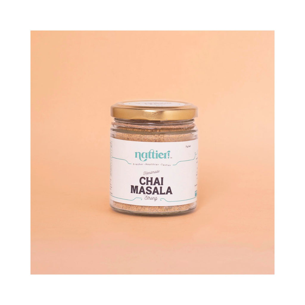 Jar of Nattier Chai Masala on a peach background