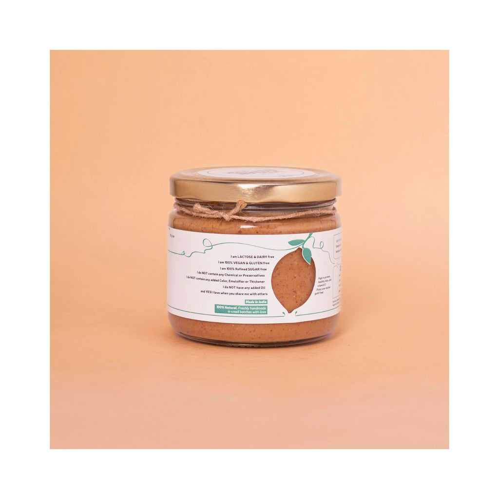 Jar of vegan butter with benefits label on a peach background