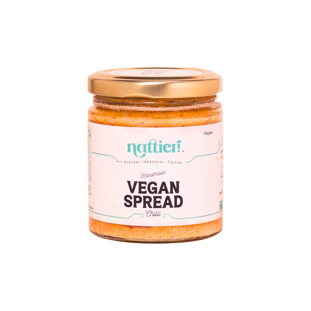 Jar of vegan chilli spread with white label on white background