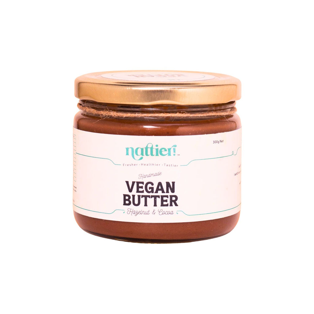 Jar of vegan butter with a visible brand label on a white background