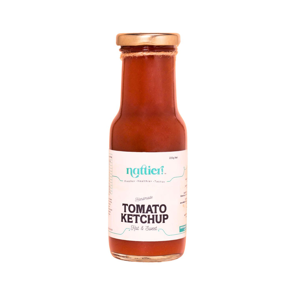 Bottle of hot & sweet ketchup with white label on a white background
