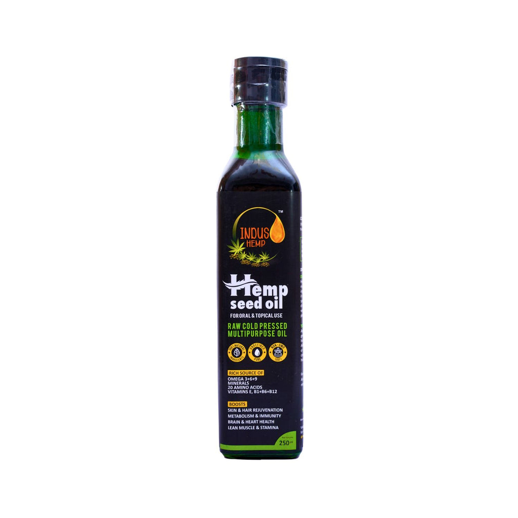 Bottle of hemp seed oil with Indus Hemp branding on a white background