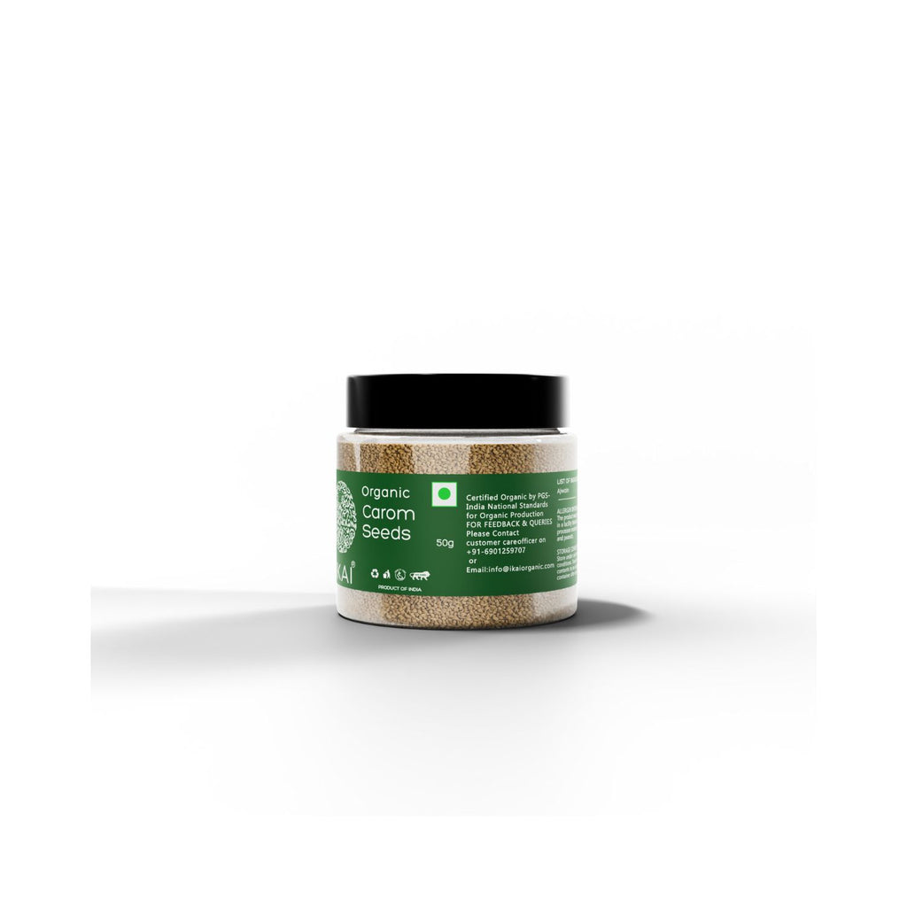 Jar of organic carom seeds with organic certification on a green label on a white background