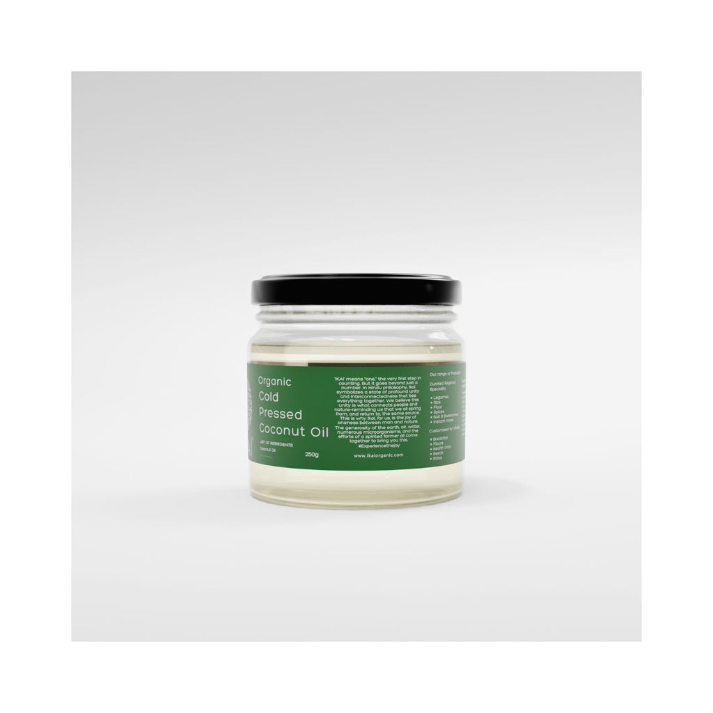 Jar of organic cold-pressed coconut oil with a green label on a white background showing text of IKAI meaning