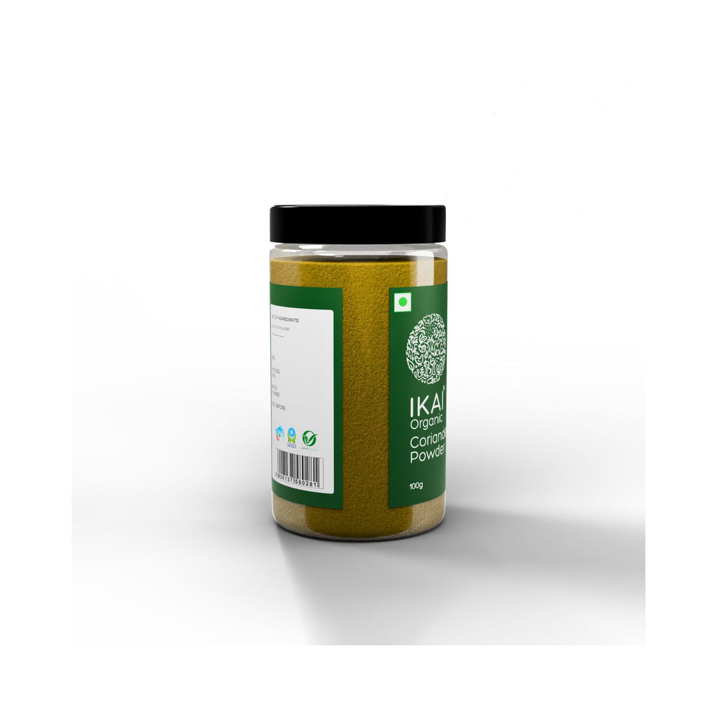 Jar of ikal organic coriander powder on a white background