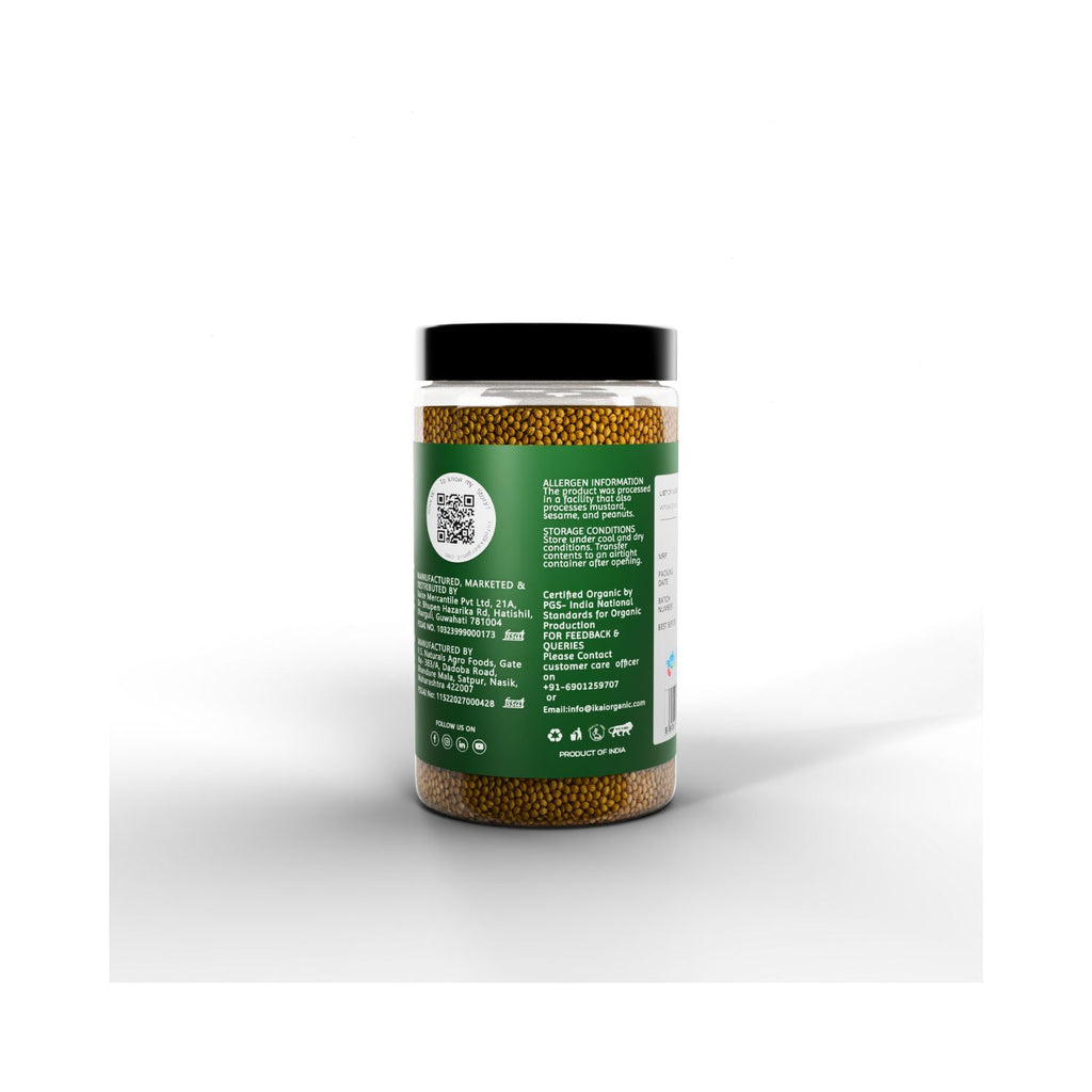 Jar of IKAI Organic Coriander Seeds with text of allergen info on a green label on a white background
