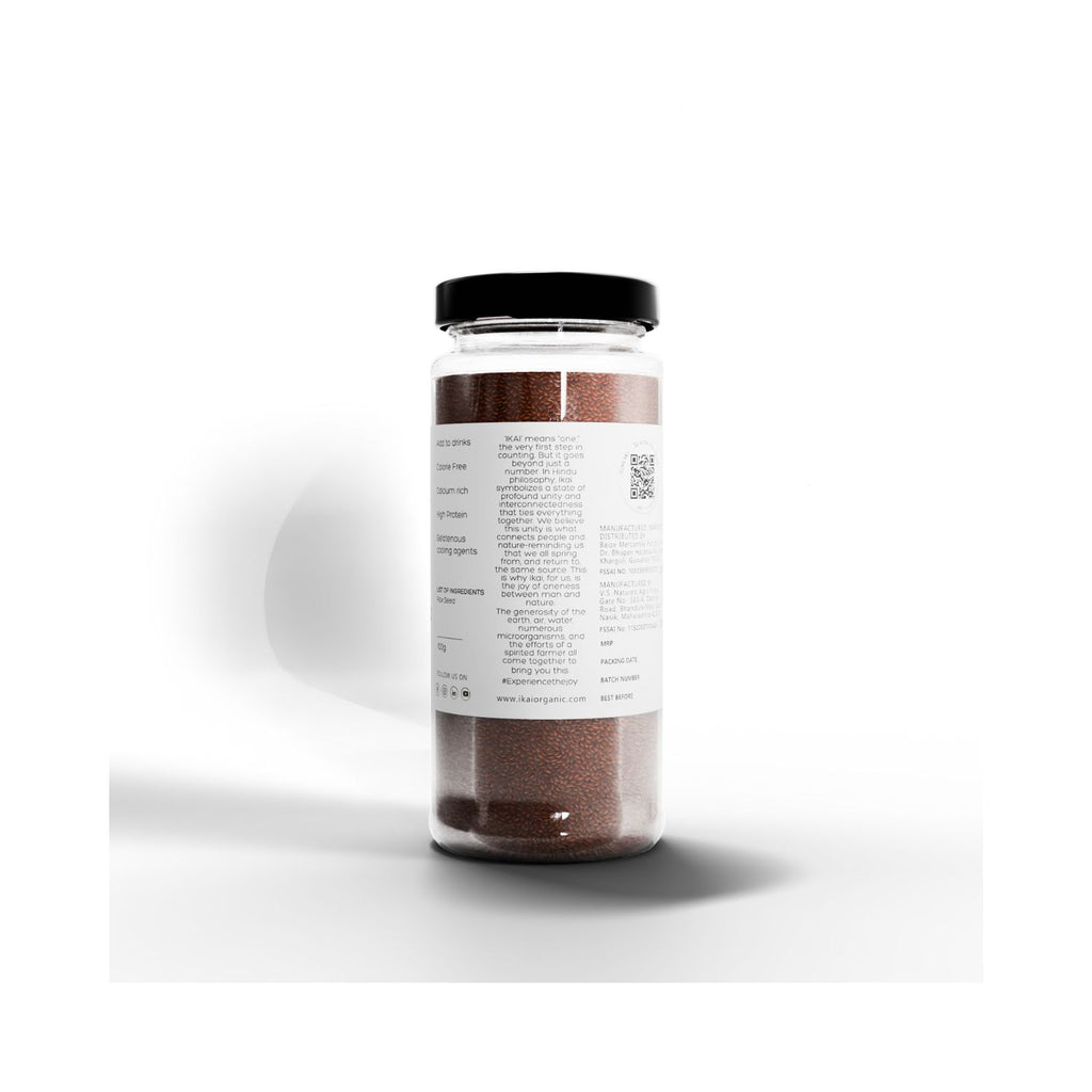 Jar of IKAI organic roasted flax seeds with a label on a white background with text about IKAI meaning