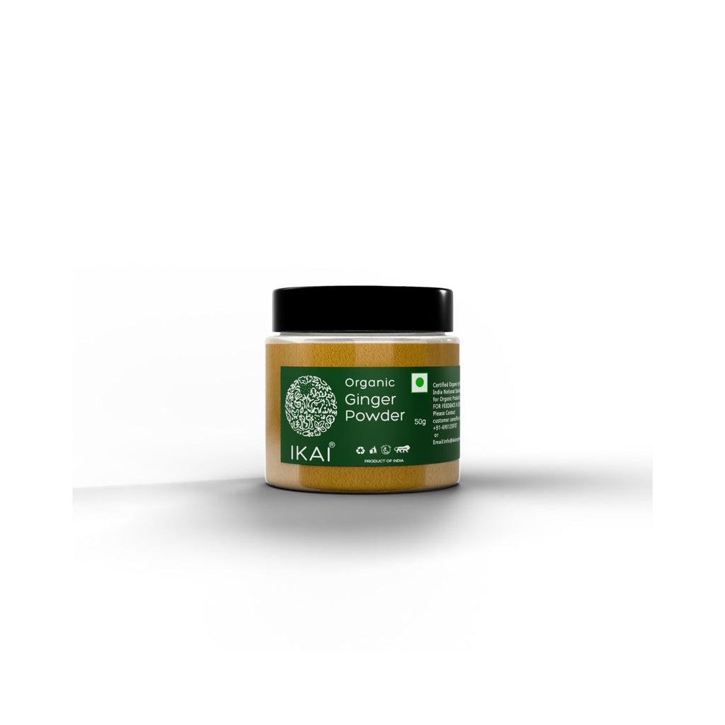 Jar of organic ginger powder with a green label on a white background