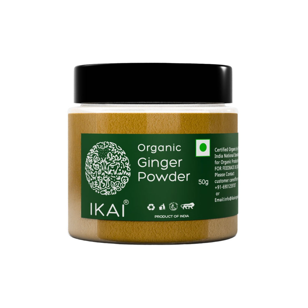 Jar of organic ginger powder with IKAI branding on a white background