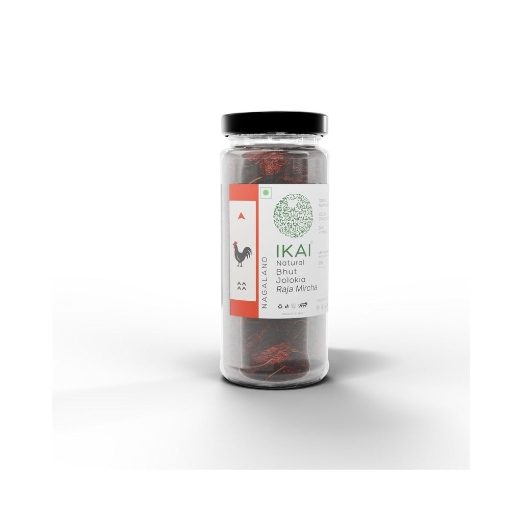 Jar of IKAI natural bhut jolokia on a white background witha red and white label