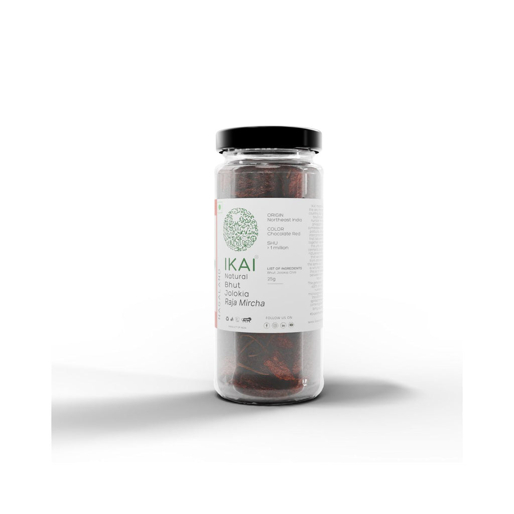 Jar of IKAI natural bhut jolokia with a white label on a white background showing product origin