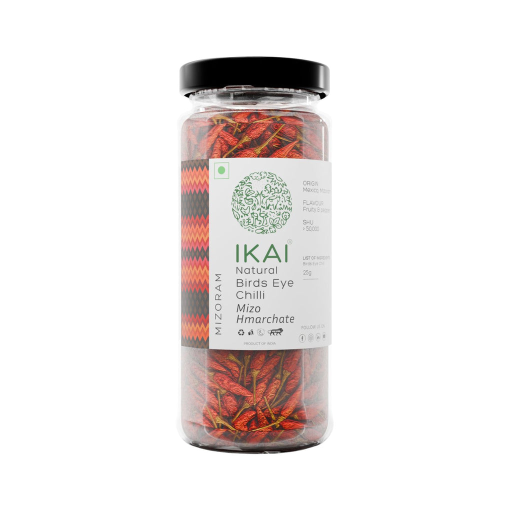 Jar of IKAI natural bird's eye chili peppers on a white background