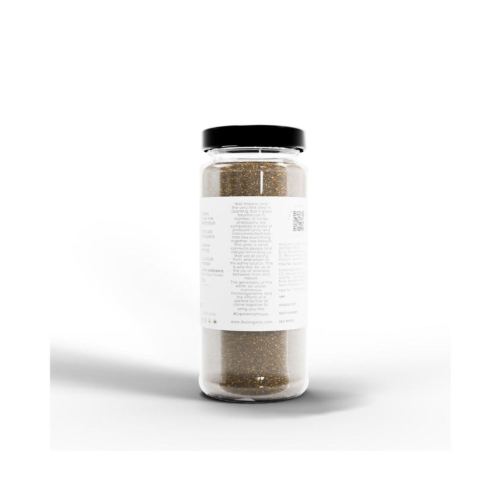 Jar of IKAI natural black pepper powder with a label on a white background showing text of IKAI meaning