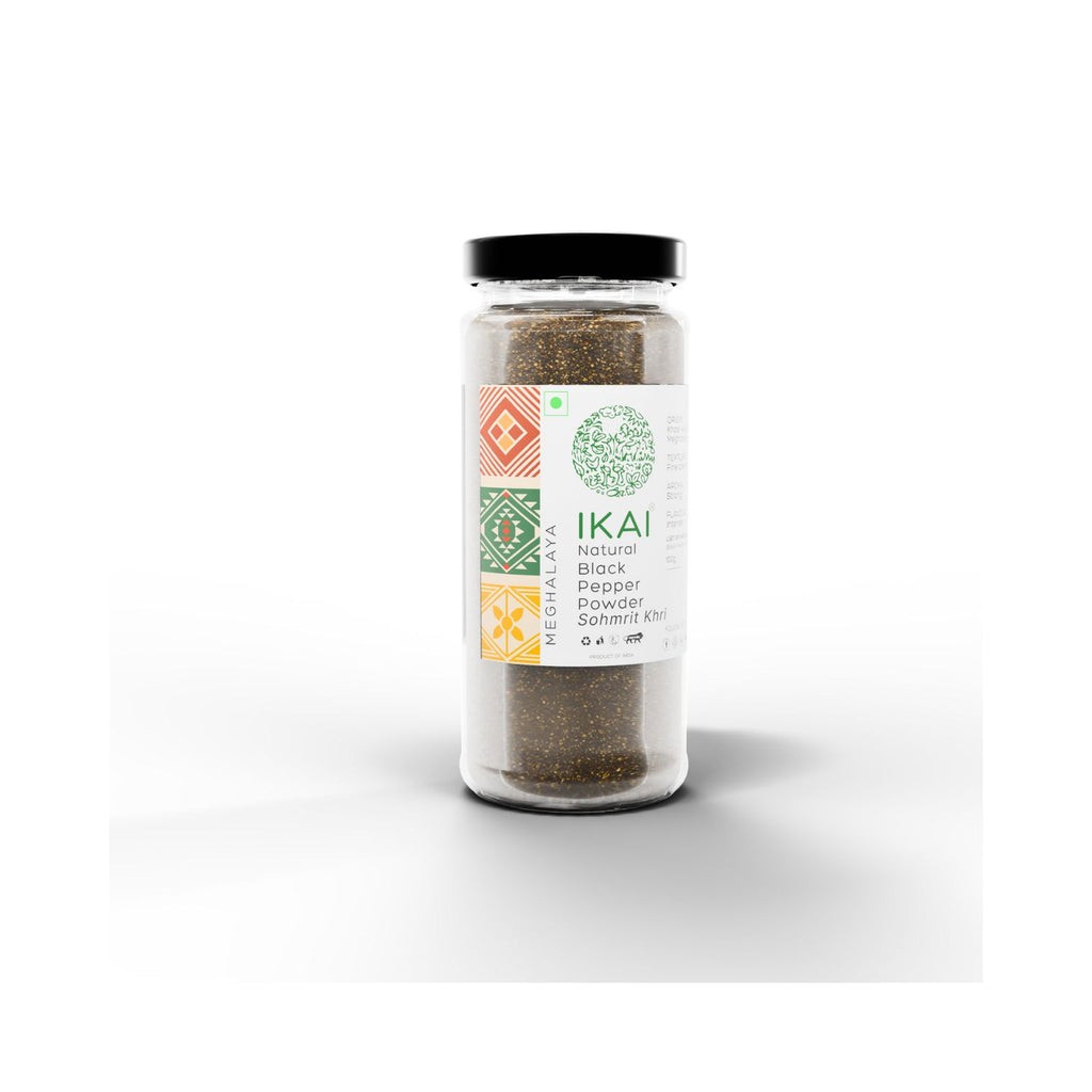 Jar with IKAI natural black pepper powder  on a white background different angle