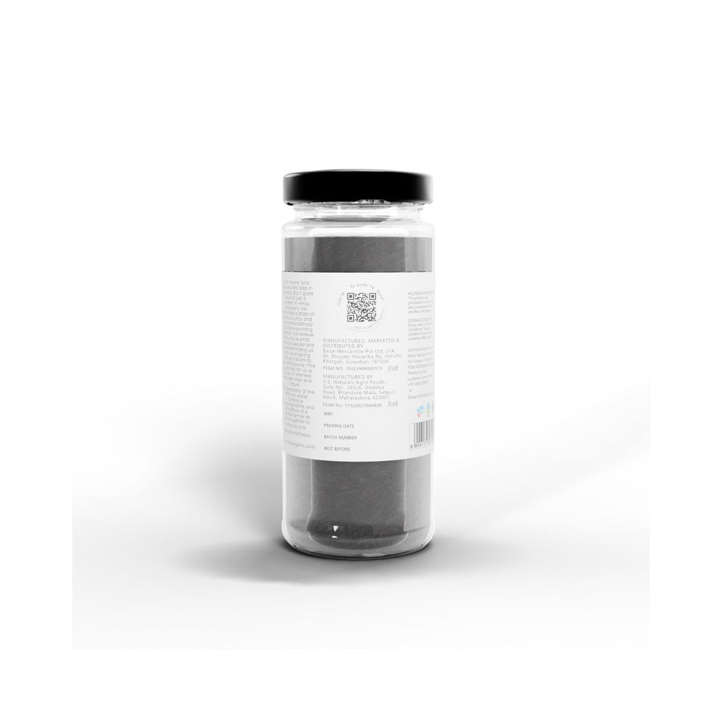 Jar with a black lid of IKAI natural kokum with manufacturing info on a label on a white background