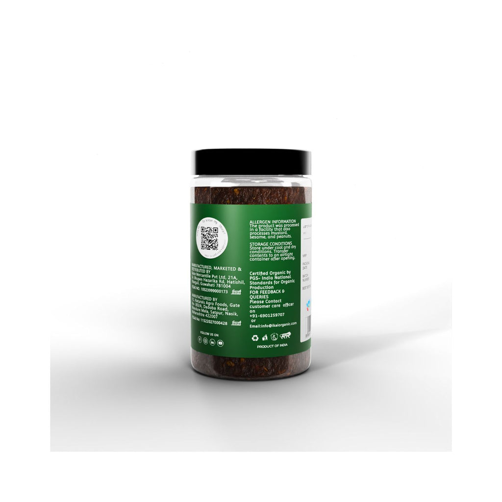 Jar of IKAI Natural Seedless Tamarind with allergen info on a green label on a white background