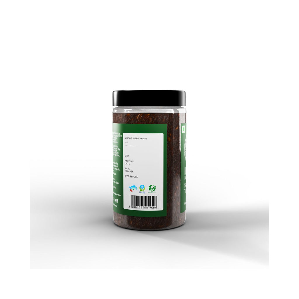 Jar of IKAI Natural Seedless Tamarind with price info on the label on a white background