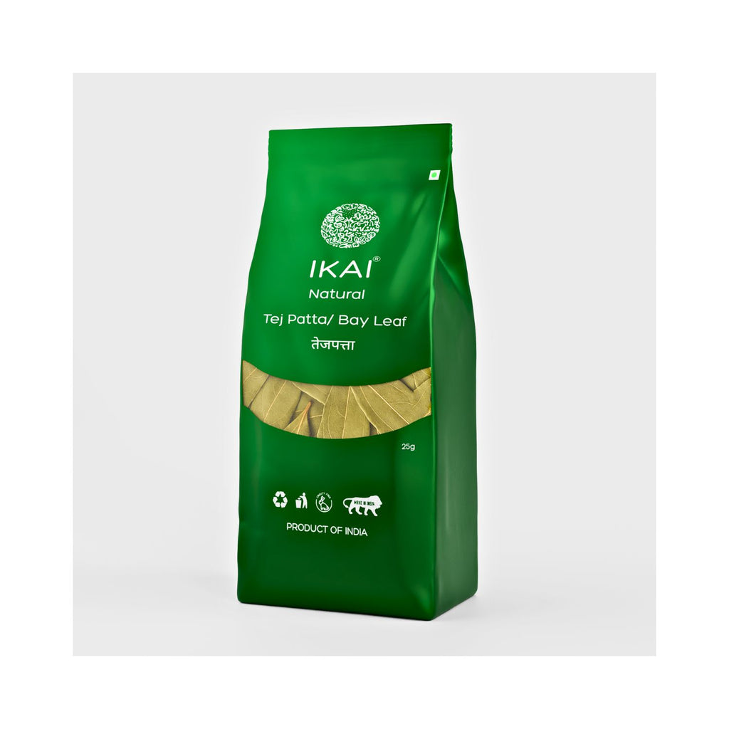 Green bag of IKAI Tej Patta Bay Leaf on a white background at an angle