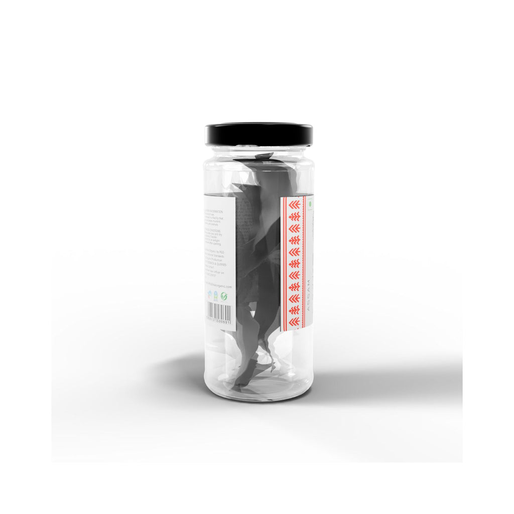 Jar of IKAI natural thekera tenga fruit spice with black lid on a white background showing barcode