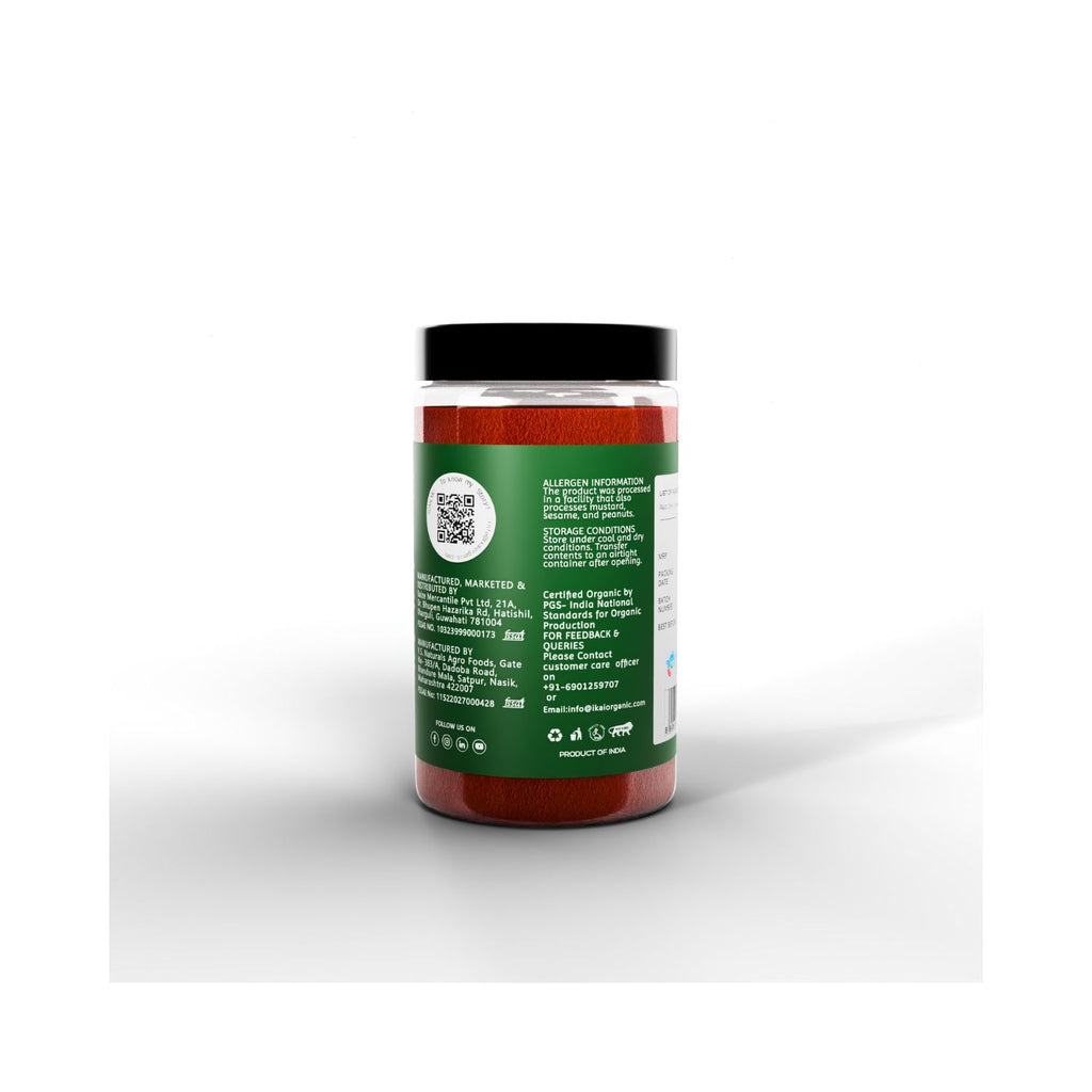 Ikai red chilli powder jar with green label about allergen info on a white background