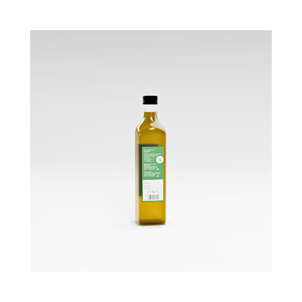 Bottle of olive oil with a green label on a white background showing barcode and manufacturer info