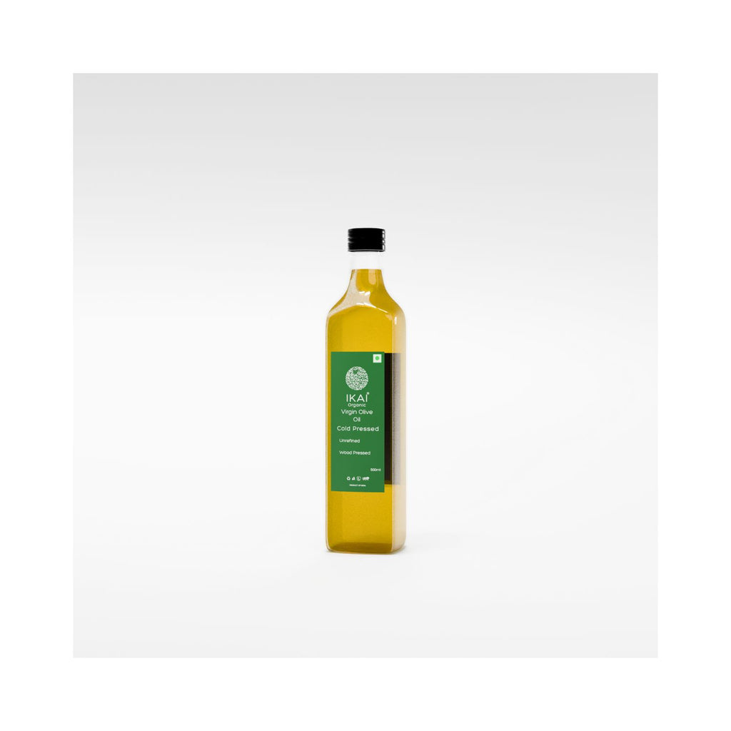 Bottle of olive oil with a green label on a white background two third angle