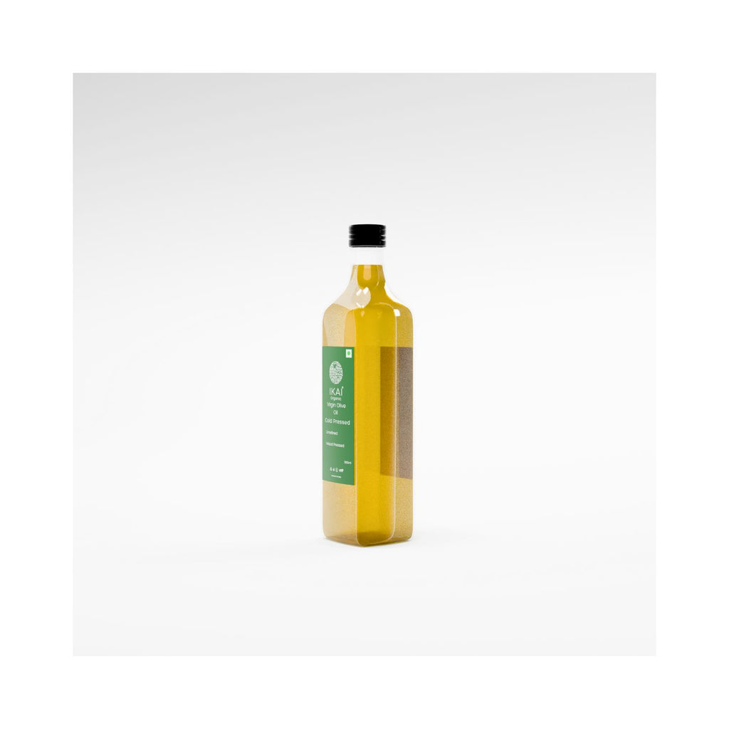 Bottle of olive oil with a green label on a white background three fourth angle