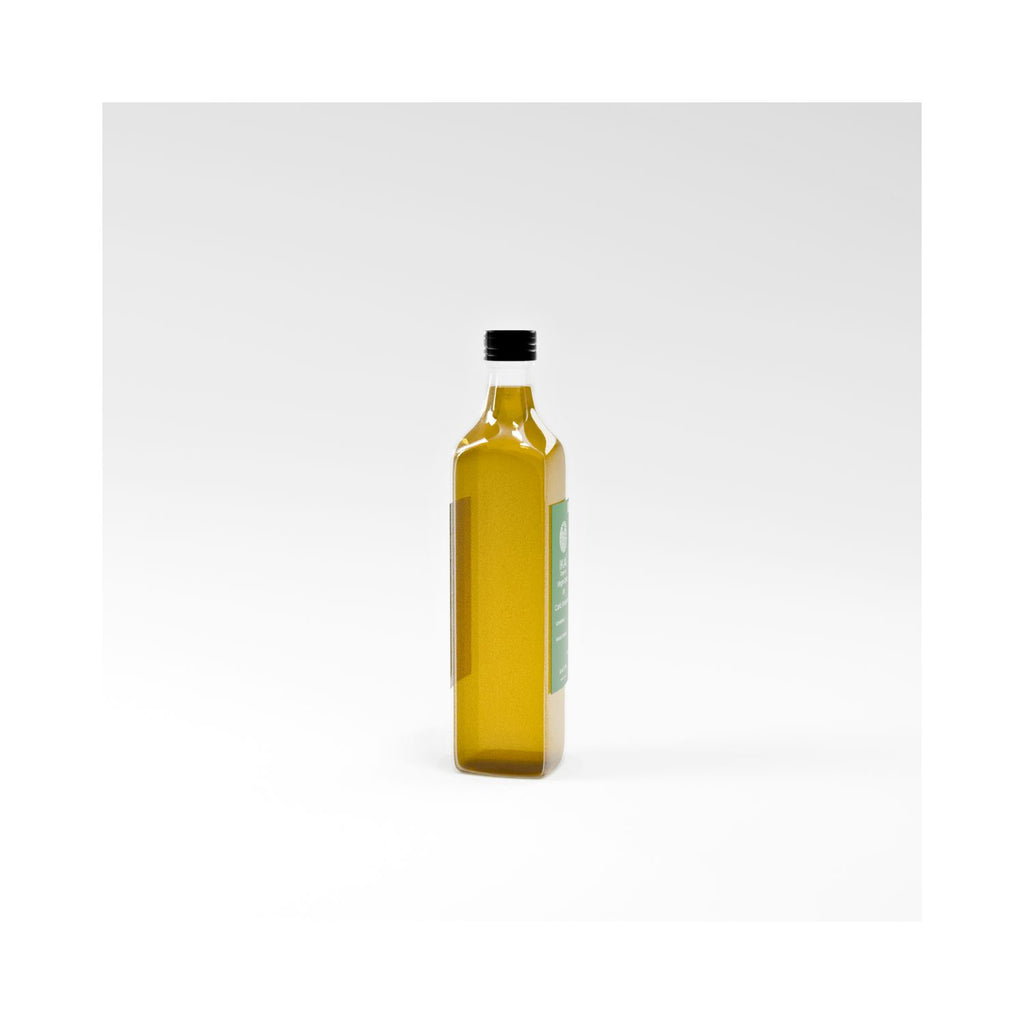 Bottle of olive oil on a white background other side of bottle