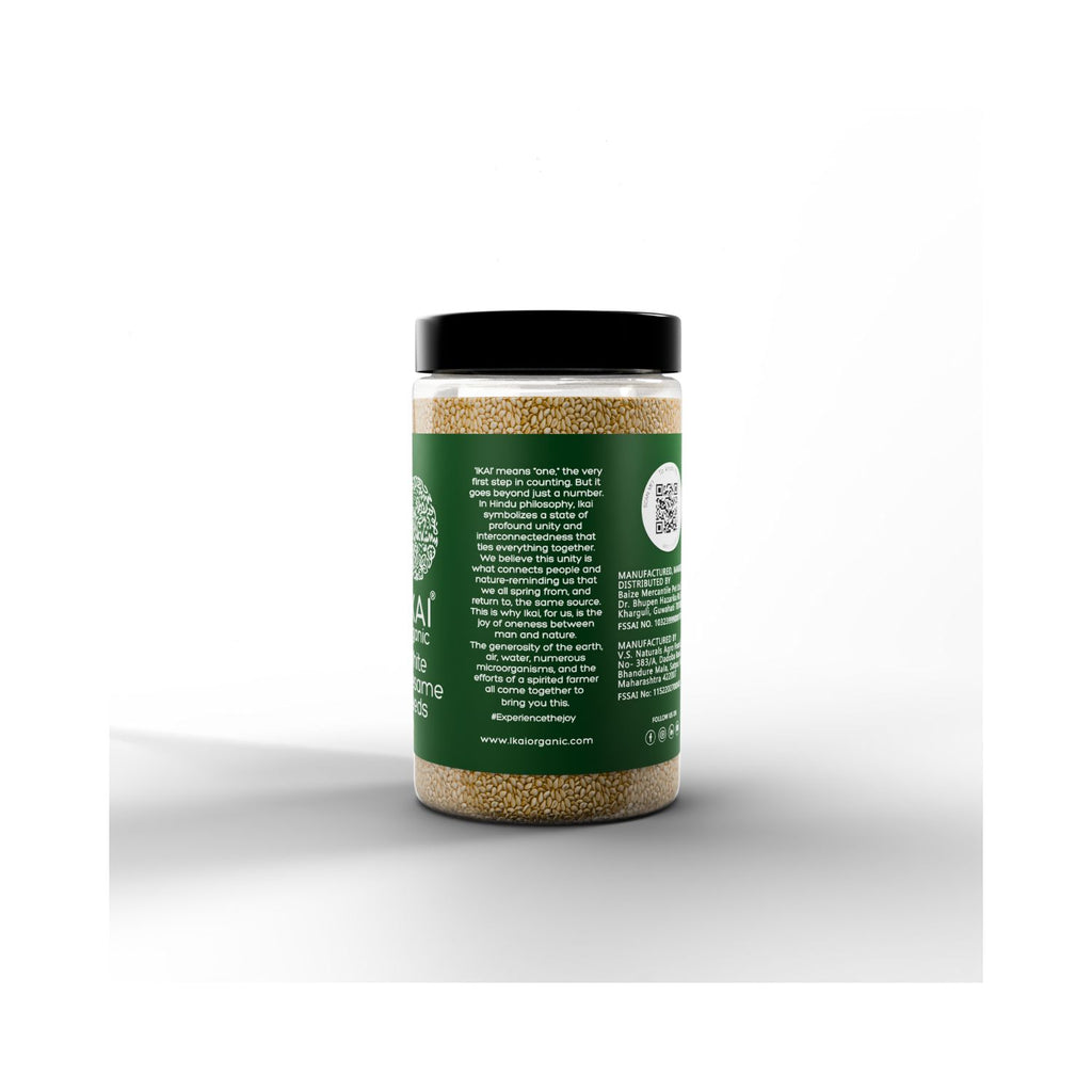 Jar of IKAI Organic White Sesame Seeds  with a green label on a white background with text about IKAI meaning