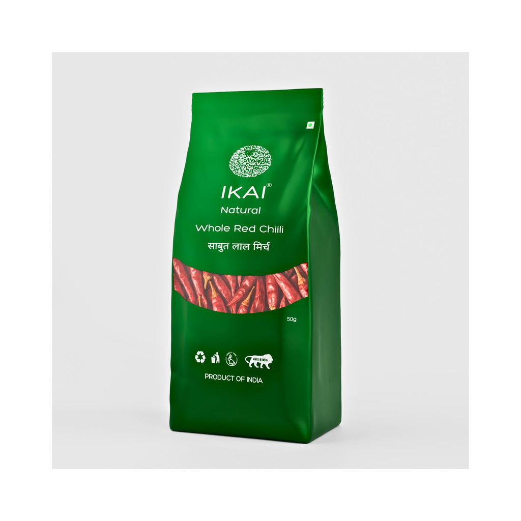 Green bag of IKAI whole red chili on a white background