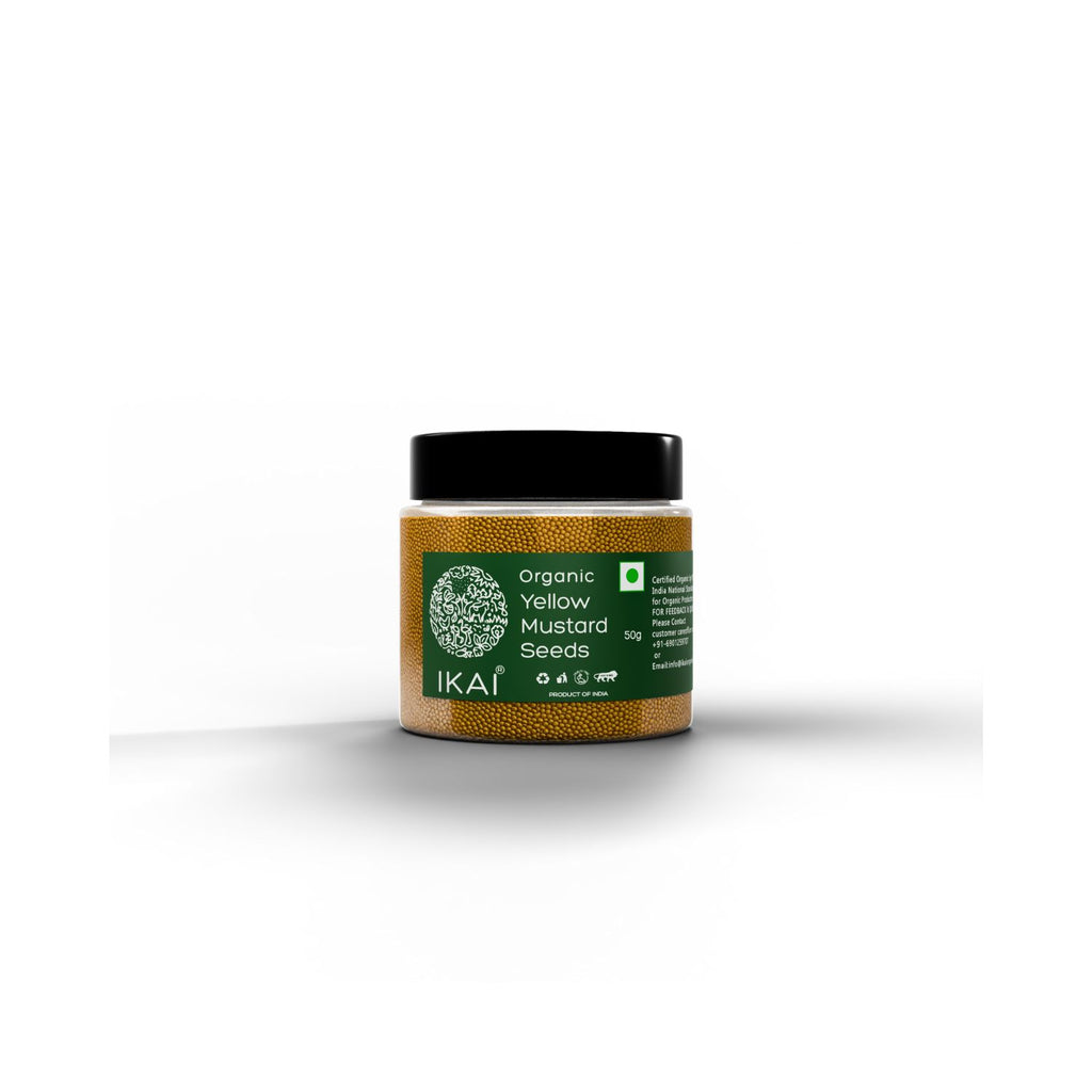 Jar of organic yellow mustard seeds with a green label on a white background