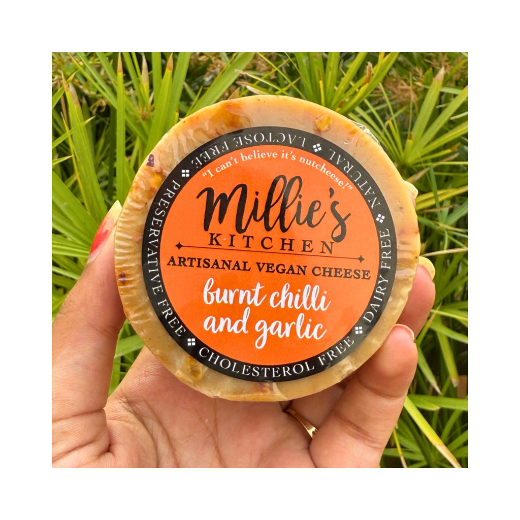 millie_s_kitchen_burnt_red_chilli_and_garlic_vegan_wheel_cheese_150g_pack_front_3