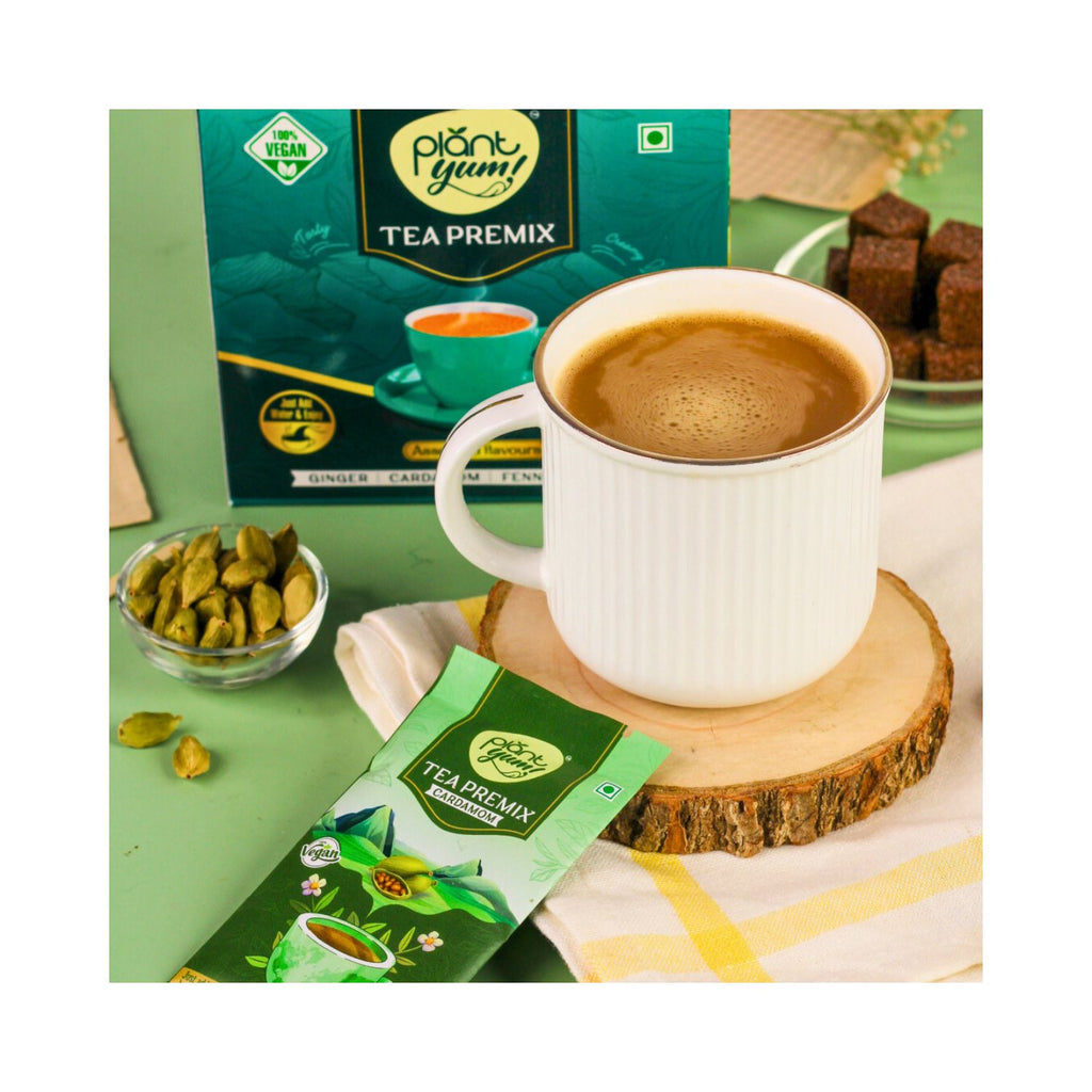 plant_yum_instant_tea_premix_cardamom_elaichi_vegan_pack_of_12_18g_216g_pack_front_lifestyle_2