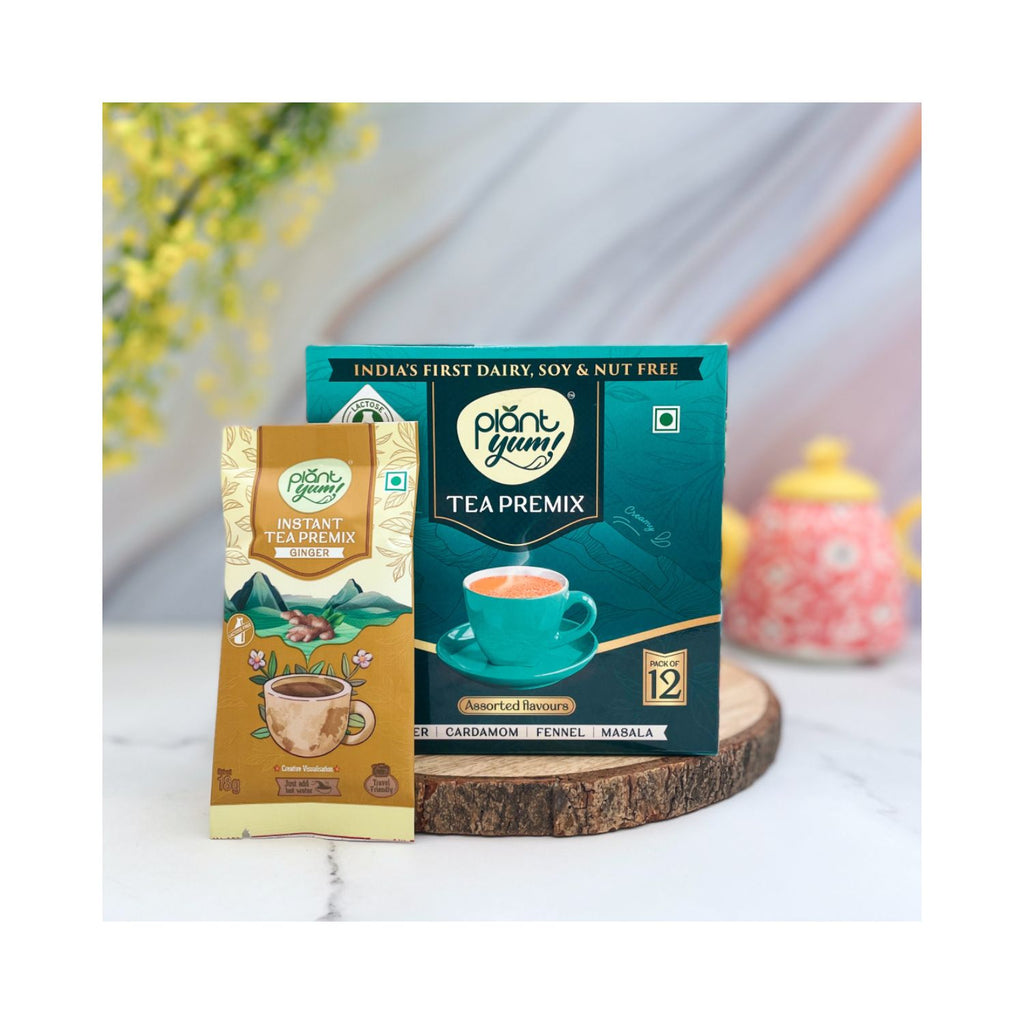 plant_yum_instant_tea_premix_ginger_adrak_pack_of_12_18g_216g_pack_front_lifestyle_1