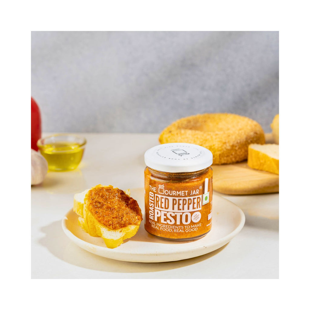 the_gourmet_jar_roasted_red_pepper_pesto_with_chironji_seeds_190g_jar_front_lifestyle
