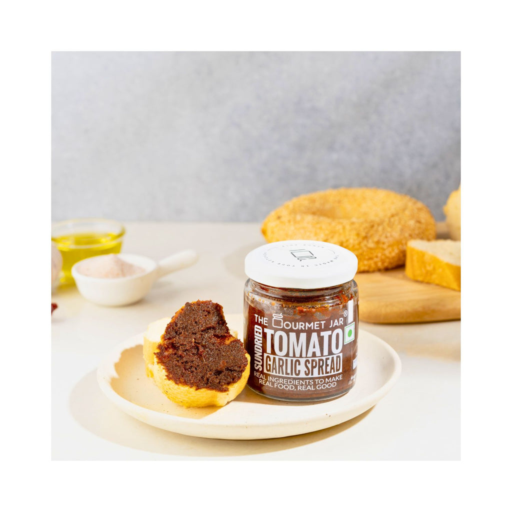the_gourmet_jar_sundried_tomato_garlic_spread_with_naga_chilli_190g_jar_front_lifestyle