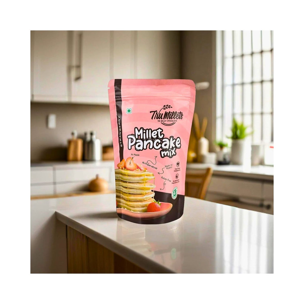 tru_millets_millet_strawberry_pancake_mix_pack_of_3_450g_pack_front_on__kitchen_table